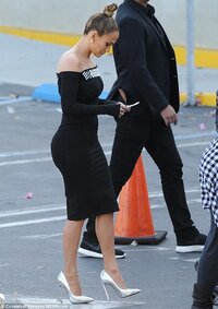 jennifer-lopez-black-dress-top-knot-casadei-silver-pumps.jpg