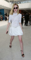 Elle-Fanning-in-White-Dress-at-Nice-Airport--06.jpg