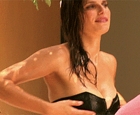 Lake-Bell-adjusts-her-boobs.gif